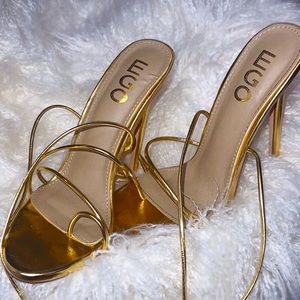 Gold sexy strappy heels. Never worn. Lace up heels. Size US 7.